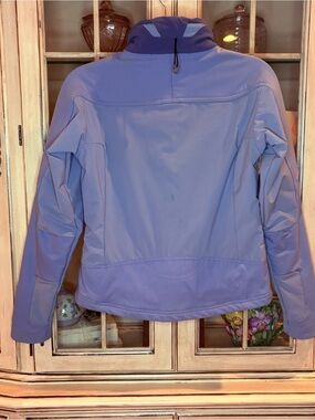 Patagonia Women's Lavender Softshell Ski Jacket with zippered pockets